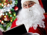 Kerstkaart: Santa Claus leest in zijn grote boek