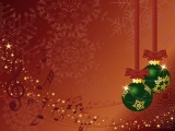 Kerstkaart: Groene kerstballen met daarop gele sneeuwvlokken hangen aan roodbruine strikken tegen een roodbruine achtergrond met sneeuwvlokken en muzieknoten